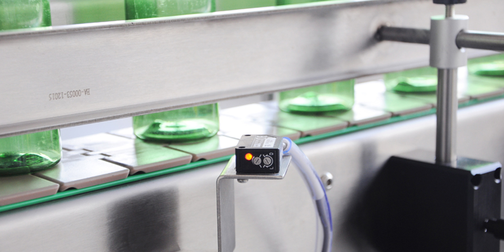 青蛙王子平面圆瓶贴标机解决方案